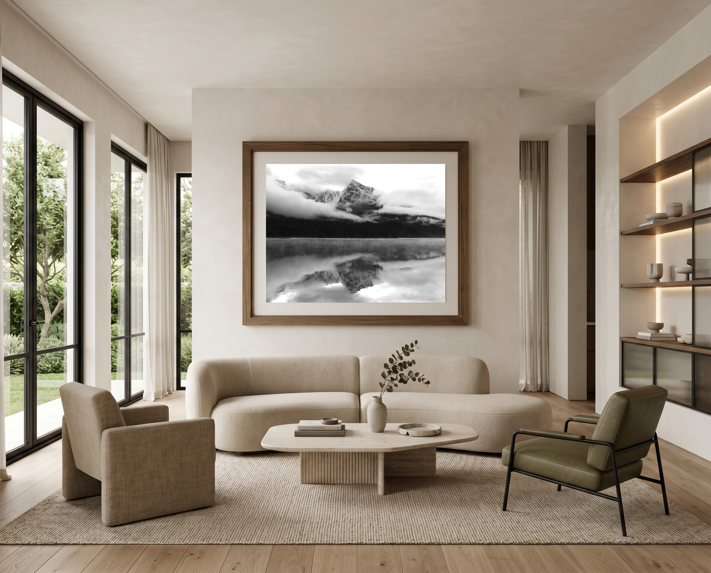 Warm modern living room with large B&W mountain reflection print by Dan Sproul — walnut frame white mat